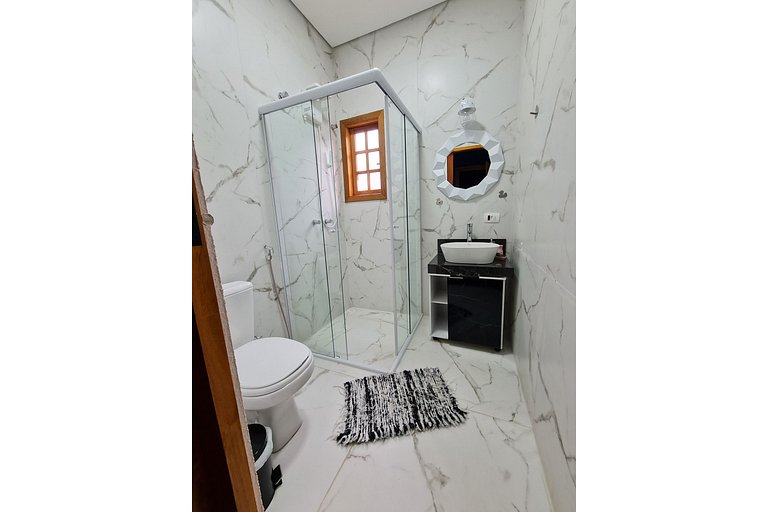 Suíte Bela Vista com hidromassagem, lareira elétrica e deck