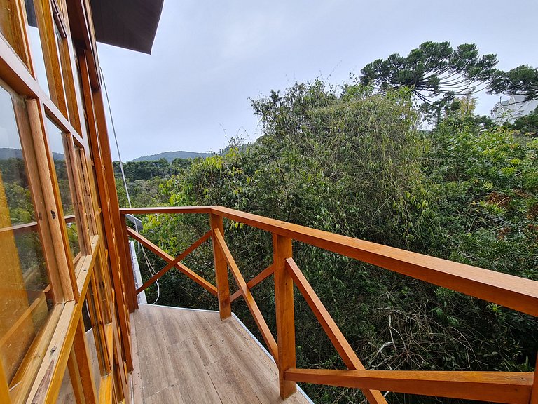 Suíte Bela Vista com hidromassagem, lareira elétrica e deck